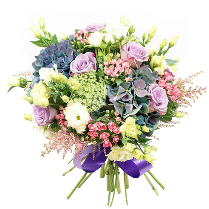 Expertly composed by a skilled Bexley florist, this vibrant bouquet pays homage to the borough's natural beauty and community spirit. Richly hued hydrangea clusters in deep blue, teal, and subtle violet dominate the arrangement, their textured petals reminiscent of blossoming trees along local park paths. Soft lavender and dreamy white roses are placed with precision, their elegant blooms opening serenely among glimmering ranunculus in full white and pale cream. Pale yellow eustoma buds offer bursts of early spring brightness, contrasting with the gentle lacework of green and white filler flowers, reminiscent of Ammi Majus gracing Bexley's hedgerows. Sprays of bright fuchsia and blush astilbe create movement and dimension, their airy forms catching the light and enlivening the bouquet's edge. Carefully situated dark green foliage frames the composition, guiding the eye to each petal and hue. The bouquet is tightly gathered and finished with a wide royal purple satin ribbon-an elegant flourish that underscores the cool, sophisticated tones of the piece. Designed for meaningful occasions, this arrangement is equally suited for joyous milestones, heartfelt gestures, or as a luxurious focal point for a family table in Bexley. Its harmonious palette and expert craftsmanship showcase the enduring artistry and warmth found in Bexley's finest floristry.